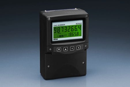A black digital process indicator with an LCD screen displaying numbers and control buttons below.
