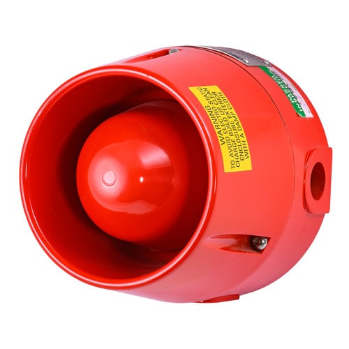 Red industrial alarm siren with warning label, viewed from the front and side against a white background.