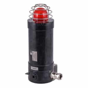 Black industrial warning light with a red dome and metal guard, mounted on a cylindrical base.