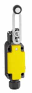Yellow industrial limit switch with roller lever on a white background.