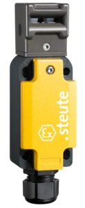 Yellow and black industrial safety switch with "steute" branding on the front.