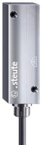 Metal rectangular industrial sensor with a cable, labeled "steute" on the side.