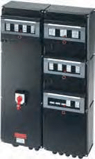 Black industrial electrical control panel with switches and indicator lights on the front.