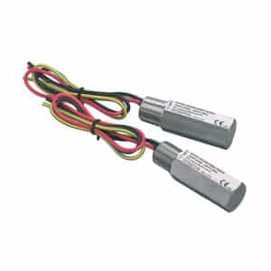 Two metal electrical sensors with red, yellow, and black wires attached, lying side by side.