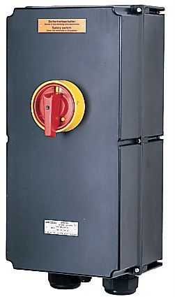 Gray industrial safety switch box with a red and yellow rotary handle on the front.